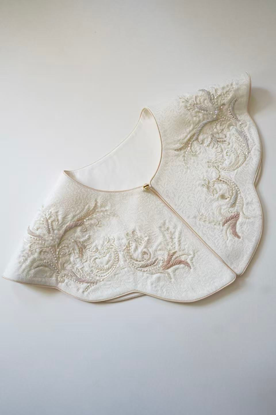 Ivory Bird-Motif Yunjian — photographed detail